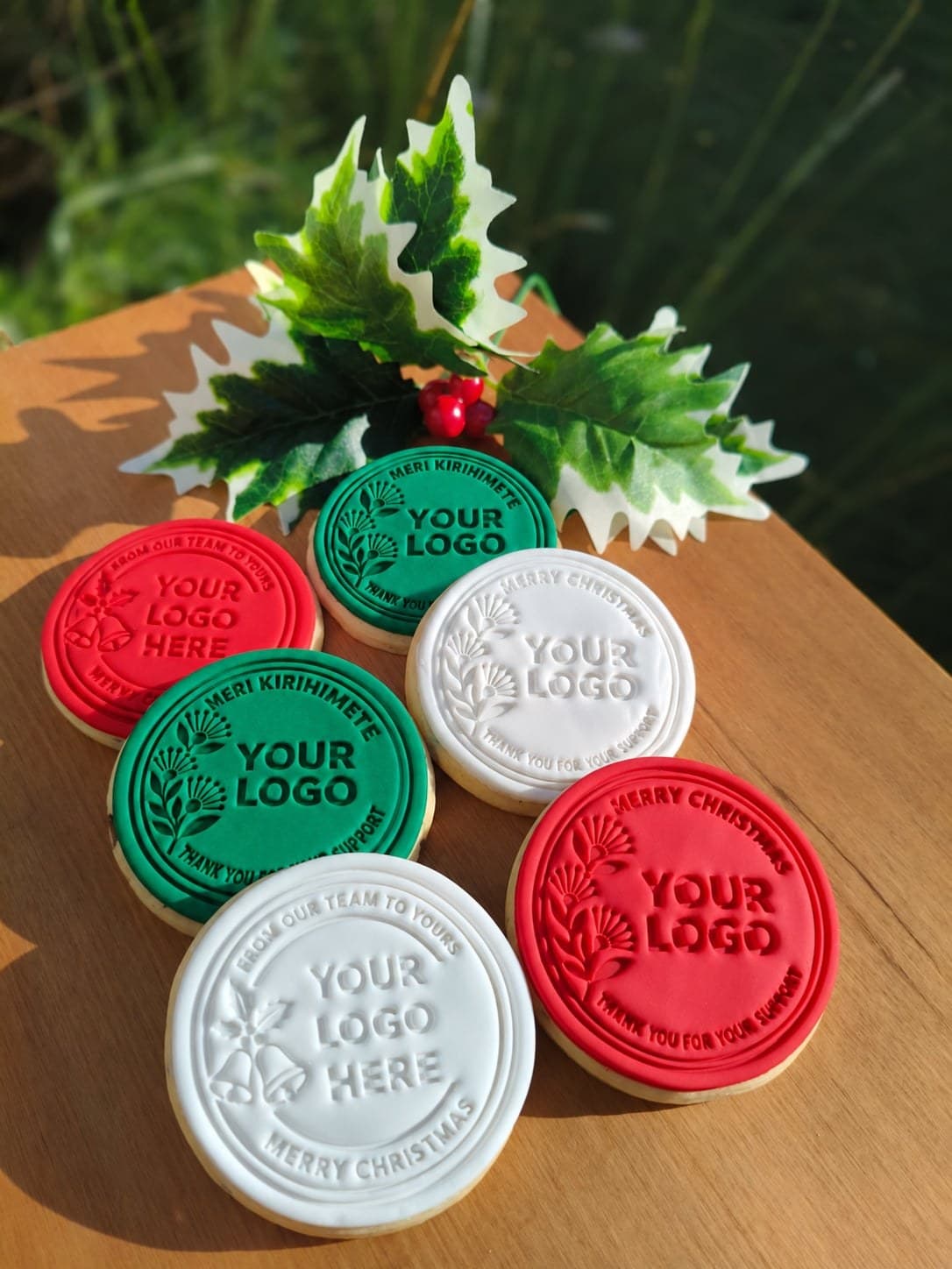 Red, green and white Christmas template cookies stamped with Your Logo, Meri Kirihimete and Merry Christmas designs